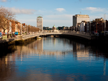 The Ha'penny Bridge stretches over the River Liffey in Dublin, Ireland
