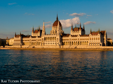 The late afternoon sun sparkles off of the Hungarian Parliament building and Danube River in Budapest.