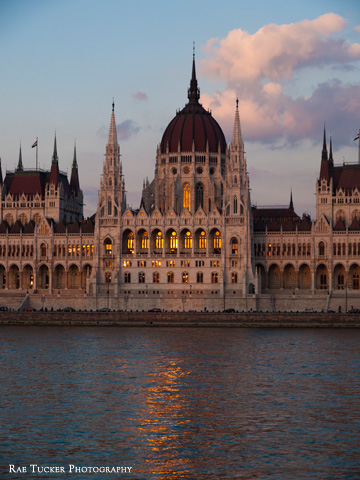 Dusks settles over the Hungarian Parliament building and Danube river in Budapest.