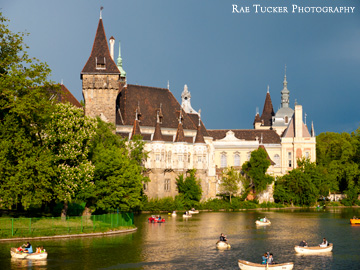 Rowers enjoy the late afternoon sun on the pond in City Park in Budapest, Hungary