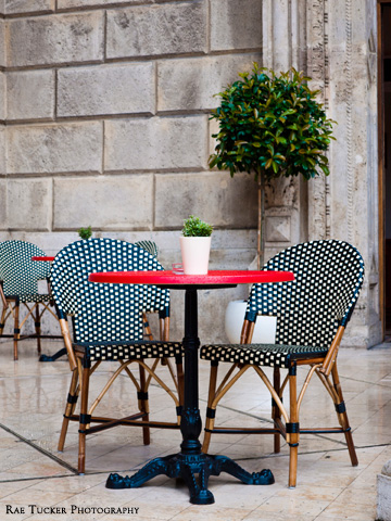 Bistro tables and chairs on a patio in Budapest, Hungary
