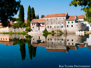 Reflections of the old town in the river in Trebinje in the Repbulic of Srpska
