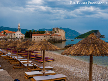 Storm clouds gather over the old town and beaches of Budva, Montenegro