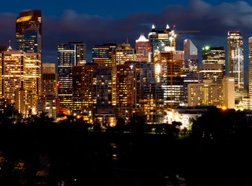The skyline of downtown Calgary, Alberta illuminated at night.