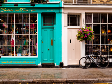 Store fronts on Portebello Road in London, England
