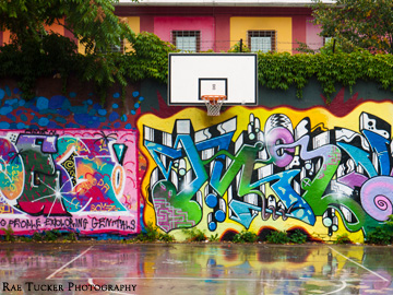 Colorful street art on a basketball court in Metelkova Mesto
