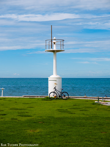 A lighthouse and bicycle in Izola, Slovenia