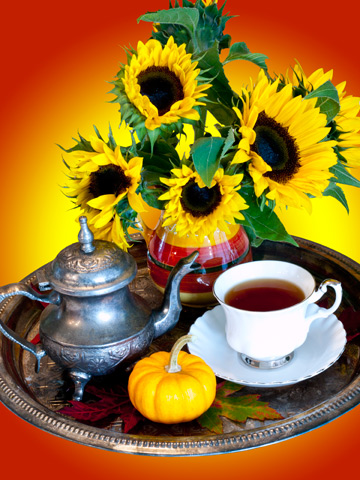 Autumn Tea Service - a silver tray decorated with an antique teapot, china teacup, pumpkin, sunflowers and leaves.