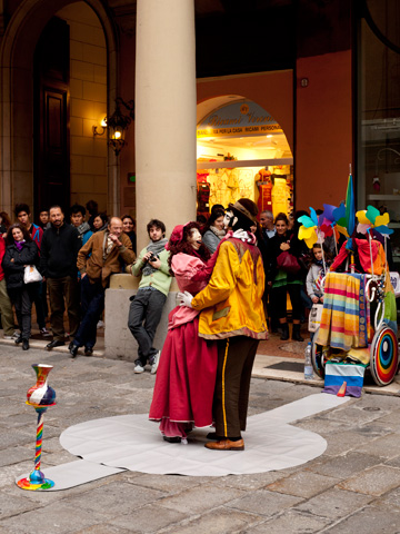 Dancing puppet street performance in Bologna, Italy