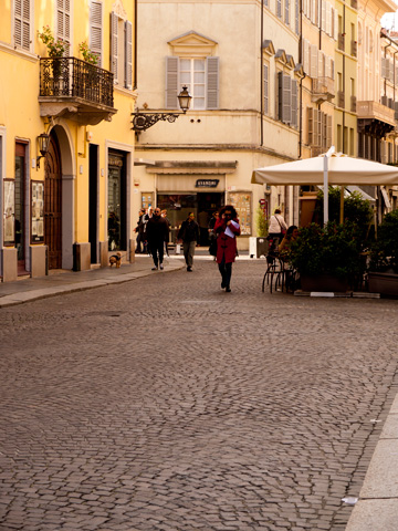 An afternoon street scene in Parma, Italy