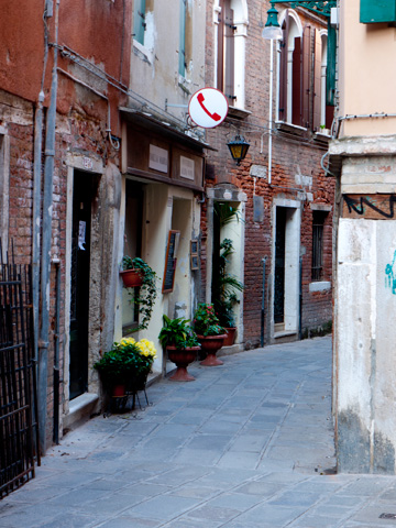 A winding alleyway in Venice, Italy.