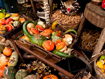 Squash, nuts and other autumn produce at a market in Rome, Italy