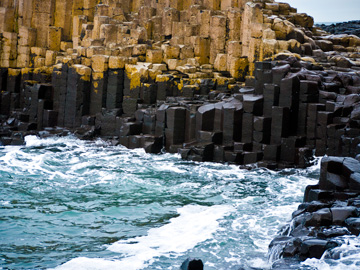 Waves of the Irish Sea lap against the Giant's Causeway