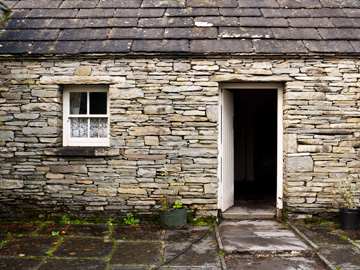 The entrance to an old stone country home in Ireland.