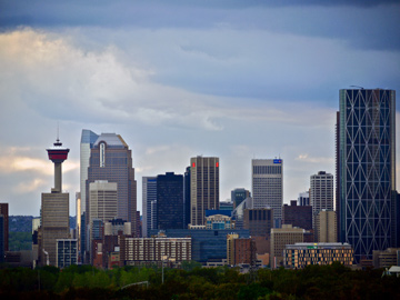 The Calgary tower stands amongst the skyline of highrises in Alberta