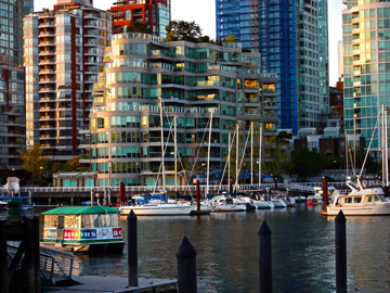 The waters of False Creek serve as home to harbours and foot ferries in Vanocuver, BC