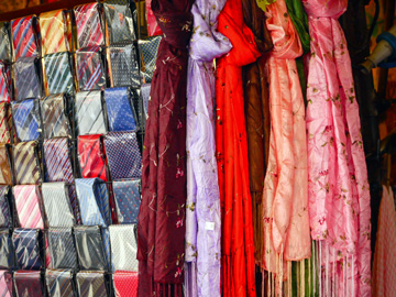 Scarves displayed at a market stall in Florence, Italy