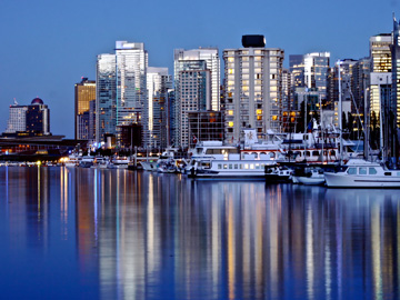 Reflections at dusk on the waters north of downtown Vancouver, Canada