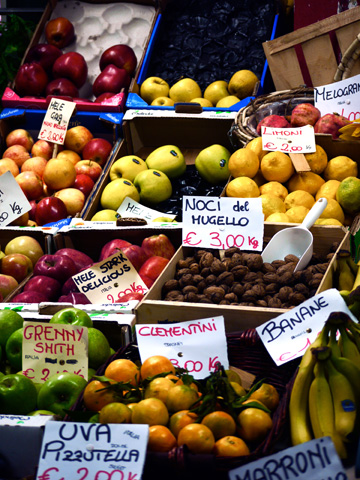 Fruit and nuts on display at San Lorenzo Market in Florence, Italy
