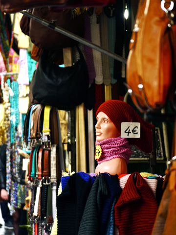 Scarves, belts & purses displayed at a market stall in Florence, Italy