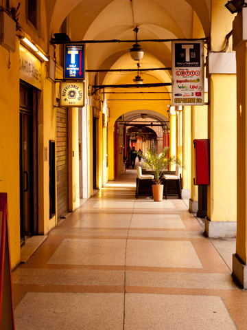 Life under a portico in Bologna, Italy.