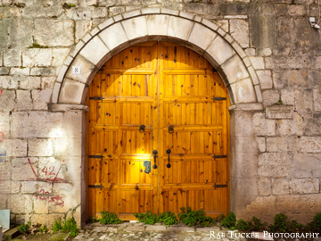 An old, wooden door in Tirana, Albania