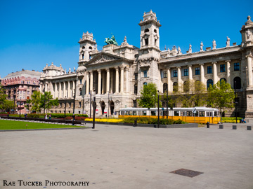 An old-fashioned tram runs before the Museum of Ethnography in Budapest, Hungary
