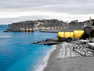 The blue sea and yellow lights on Dubrovnik, Croatia