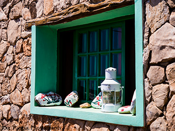 A green-framed window