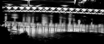 The pedestrian Peace Bridge spans over the Bow River in Calgary, Alberta.