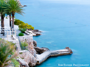 A stone dock juts into the Adriatic Sea in Dubrovnik, Croatia