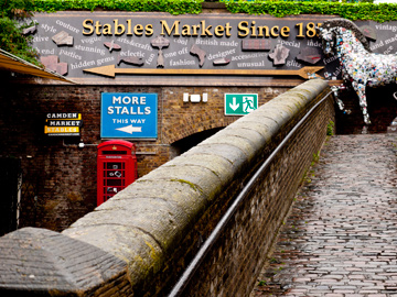 Path, sign and horse statue for the Stables Market in Camden Town