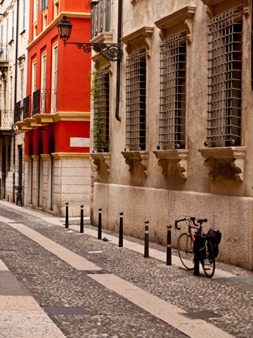 Bicycle parked on a street in Verona, Italy