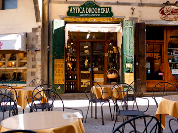 The morning light illuminates the main square in Cortona, Italy