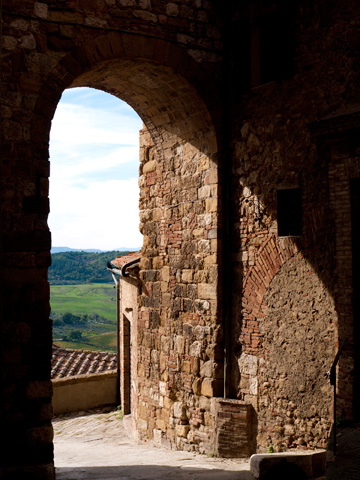 An entrance through the medieval walls of Montepulciano, Italy