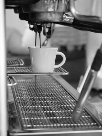 An espress bar pouring shots